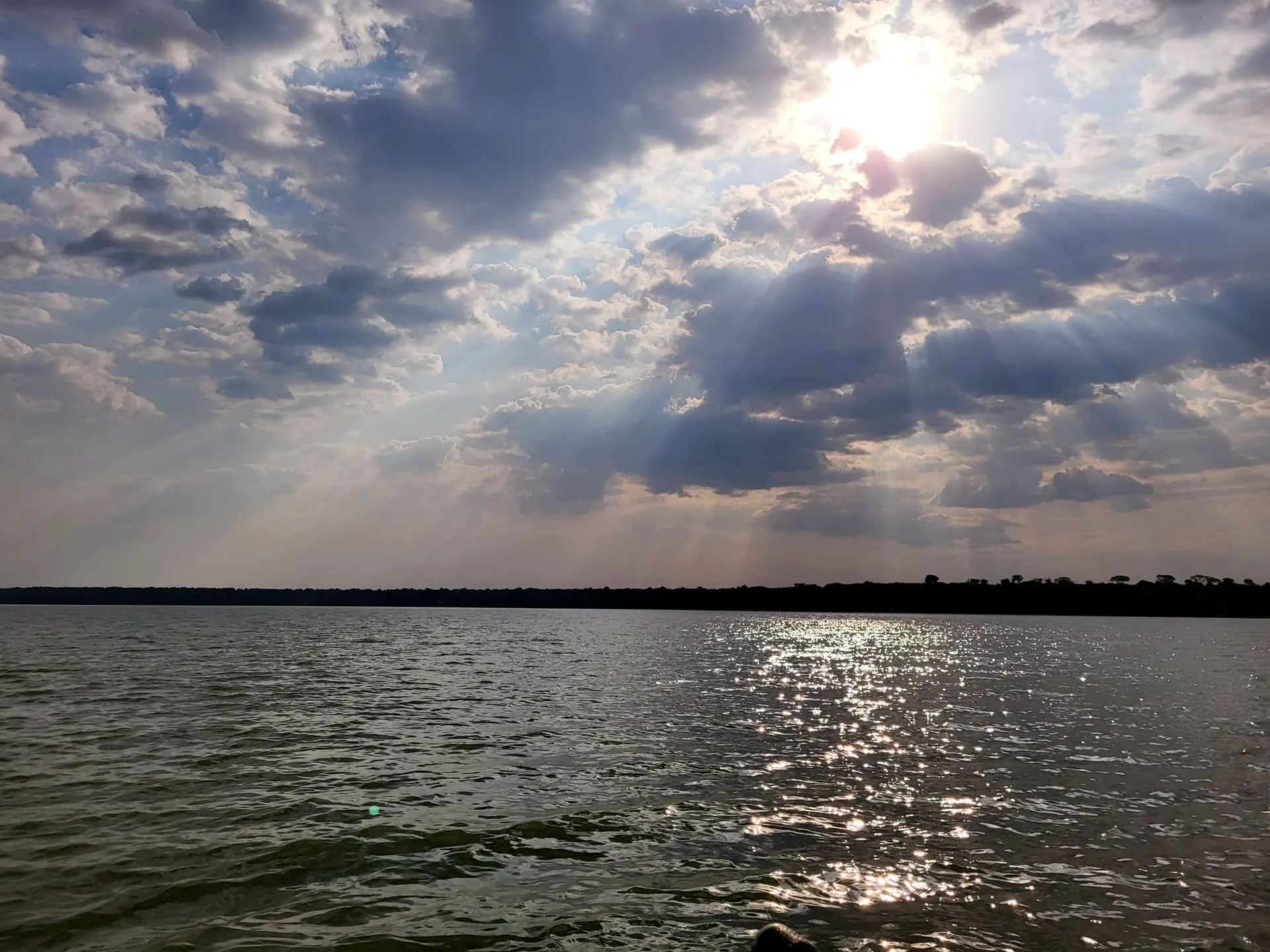 Light breaking over the waters of the Nile in Uganda